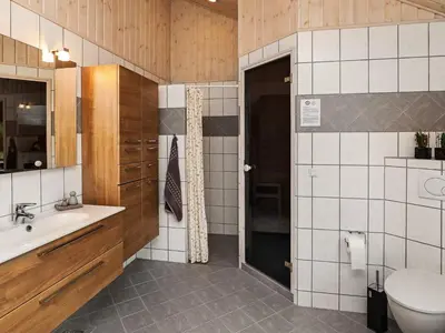 a bathroom with a sink and a toilet at 8 person holiday home in Fjerritslev in Fjerritslev