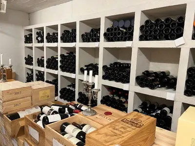 a room filled with lots of bottles of wine at Sallingsund Færgekro in Nykøbing Mors