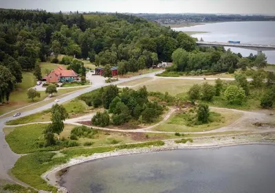 an aerial view of a house and a lake at Sallingsund Færgekro in Nykøbing Mors