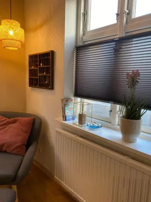 a window with a window sill with a window blind at Bredgade 10 Thyborøn in Thyborøn