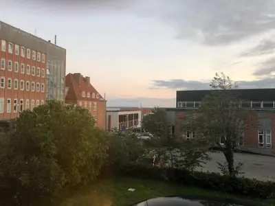 a view of a city with buildings and trees at Hel lejlighed Thisted Midtby in Thisted