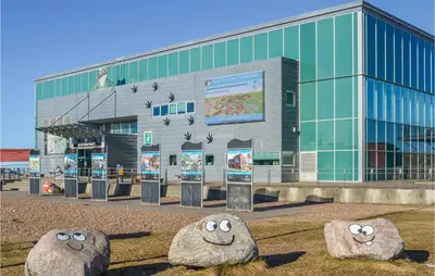 a building with a building with faces on it at Three-Bedroom Holiday Home In Harboore in Harboør