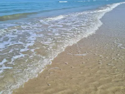 a close up of the sand and water on a beach at Secluded Beach Retreat in Rodhus-By Traum in Pandrup