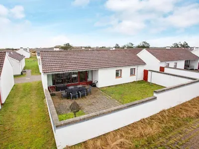 an aerial view of a house with a backyard at Secluded Beach Retreat in Rodhus-By Traum in Pandrup