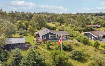 an aerial view of a house on a hill at Three-Bedroom Holiday Home In Fur in Fur