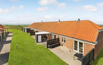 an aerial view of a house with an orange roof at Two-Bedroom Apartment In Lemvig in Lemvig