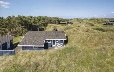 an overhead view of a house on a hill at Beautiful Home In Blokhus With Wifi in Blokhus