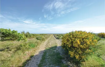 a dirt road in the middle of a field at Three-Bedroom Holiday Home In Hurup Thy in Sindrup
