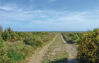 a dirt road in the middle of a field at Three-Bedroom Holiday Home In Hurup Thy in Sindrup