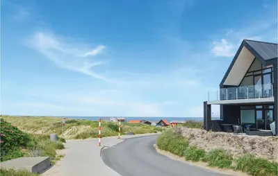 a house on the side of a road at Two-Bedroom Apartment In Thisted in Thisted