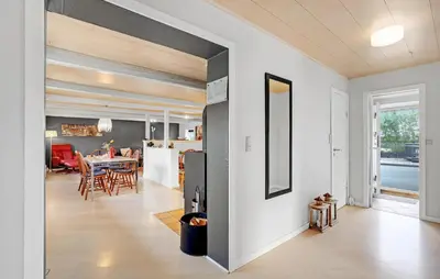 a kitchen and dining room with white walls at Two-Bedroom Holiday Home In Spottrup in Spottrup