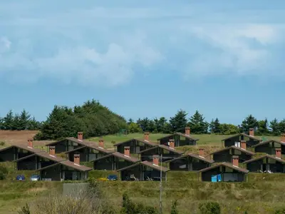 a group of houses on top of a hill at Type2 holiday home in Hanstholm in Hanstholm