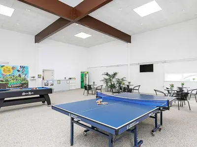 a room with a ping pong table in it at 6 person holiday home in Brovst in Brovst