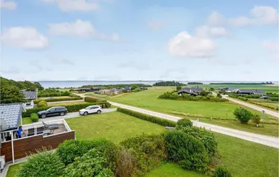 an aerial view of a house with a yard at 3 Bedroom Stunning Home In Snedsted in Snedsted