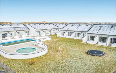 an overhead view of a building with a swimming pool at Feriehotel Tranum Klit in Brovst