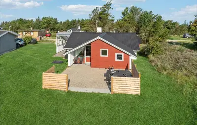an aerial view of a red house with a yard at Amazing Home In Thisted With Wifi in Thisted