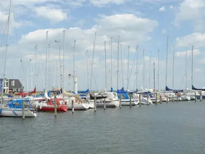a bunch of boats are docked in the water at 4 person holiday home on a holiday park in Lemvig in Lemvig