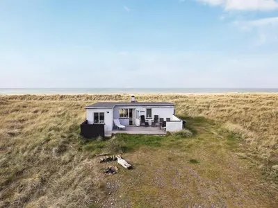 a small house in the middle of a field at 4 person holiday home in Fjerritslev in Fjerritslev