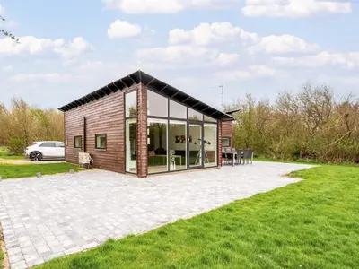 a small house with a pitched roof at 6 person holiday home in Vestervig-By Traum in Vestervig