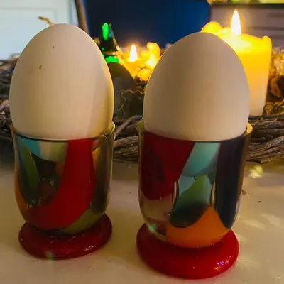 two egg candles sitting on a table with candles at Event4U in Nykøbing Mors