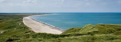 an aerial view of a beach with the ocean at Fewo Skjærnsøde in Fjerritslev