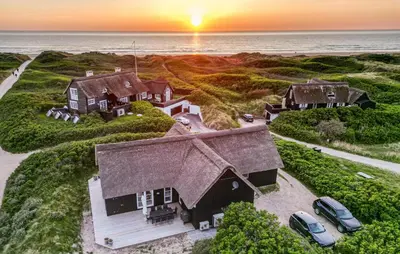 an aerial view of a house on the beach at Lovely Home In Saltum in Saltum
