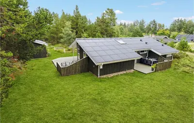 an aerial view of a house with a roof at Holiday Home Harestien Brovst in Brovst