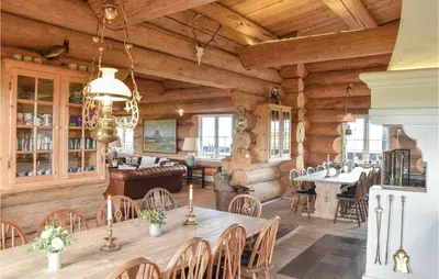 a dining room with a table and chairs at 9 Bedroom Beautiful Home In Lemvig in Lemvig