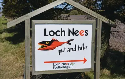 a sign that reads localnes put and take fish andtackle at Humlebo in Vemb