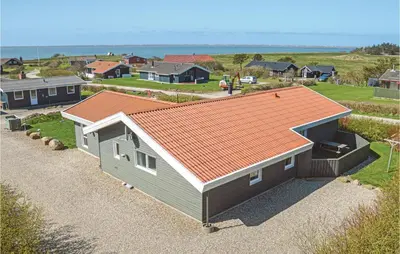 an overhead view of a house with an orange roof at Stunning Home In Vestervig With Sauna in Vestervig