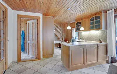 a large kitchen with a sink and a shower at Four-Bedroom Holiday Home In Thisted in Thisted