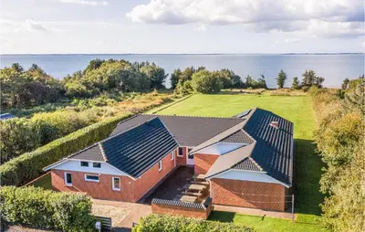 an aerial view of a house with solar panels at Stunning Home In Spøttrup With Sauna in Spottrup