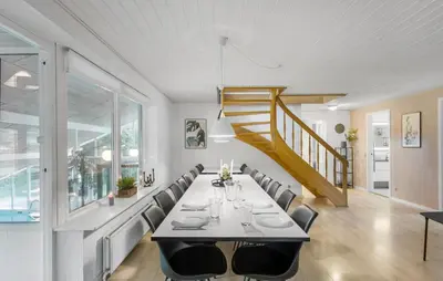 a dining room with a table and chairs at Stunning Home In Roslev With Sauna in Roslev