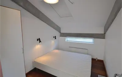 a small bedroom with a mattress in a room at Holiday Home Hesselvej in Farsø