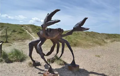 a metal statue of a crab in the desert at Holiday Home C J Thaningsvej Fjerritslev X in Fjerritslev