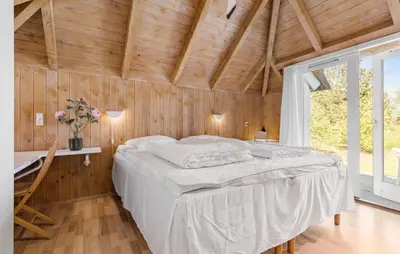 a bedroom with a bed and a desk and a window at Gorgeous Home In Fjerritslev With Wifi in Fjerritslev