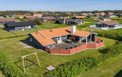 an aerial view of a house in a suburb at Holiday Home Vejlby Klit Harboøre V in Harboør
