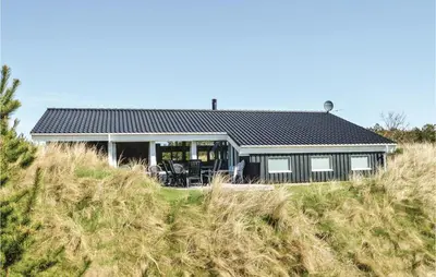 a house sitting on top of a hill at Amazing Home In Saltum With Wifi in Saltum