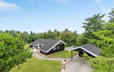 an aerial view of a house in the woods at Lovely Home In Saltum With Kitchen in Saltum