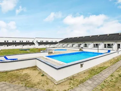 an overhead view of a building with a swimming pool at 6 person holiday home in Brovst-By Traum in Brovst