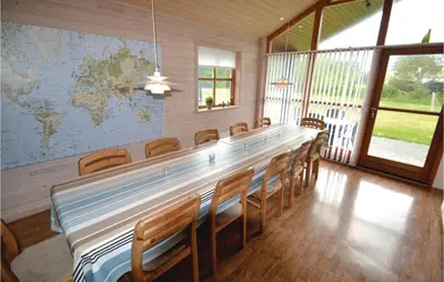 a conference room with a long table and chairs at Holiday Home Benediktesvej Løgstør X in Løgstør