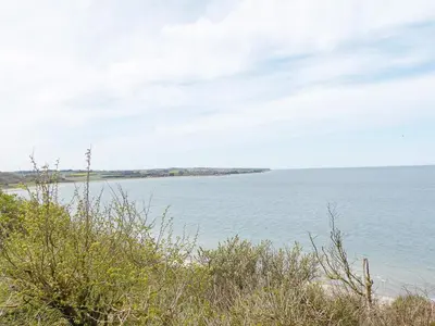 a view of a body of water with a beach at 6 person holiday home in Struer-By Traum in Struer