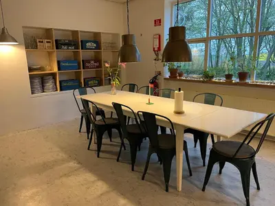 a dining room with a table and chairs at Room 4 - Hawkraft kulturhotel in Vestervig