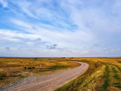 a dirt road in the middle of a field at 7 person holiday home in Lemvig-By Traum in Lemvig