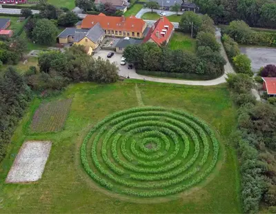 an aerial view of a spiral maze in a field at Room 15 - Hawkraft kulturhotel in Vestervig