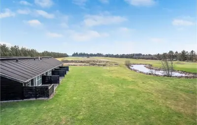 an overhead view of a building on a golf course at Stunning Home In Pandrup With Kitchen in Pandrup