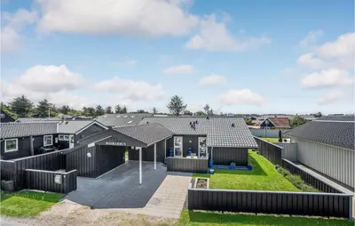 an aerial view of a row of houses at Nice Home In Blokhus With Kitchen in Blokhus