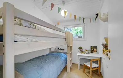 a bedroom with two bunk beds and a desk at Stunning Home In Thisted With Wifi in Thisted
