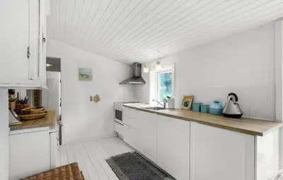 a white kitchen with white cabinets and a sink at Stunning Home In Thisted With Wifi in Thisted
