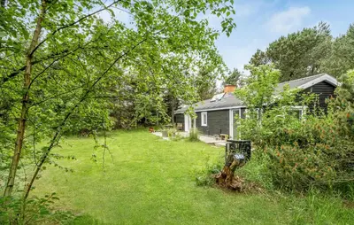 a home with a yard with a house at Stunning Home In Thisted With Wifi in Thisted